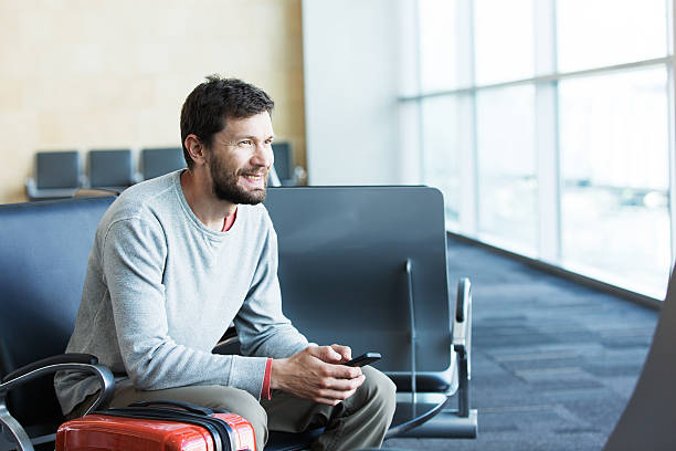 istock man working at airport 520796192