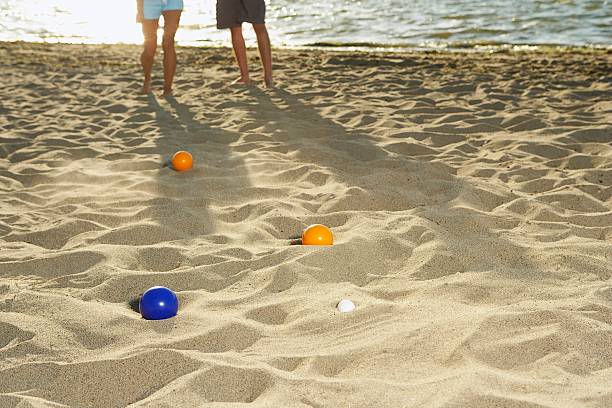 istock Couple playing on the beach 520797808