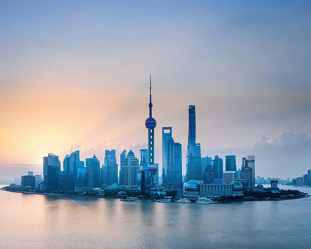 istock shanghai skyline in sunrise 520797890