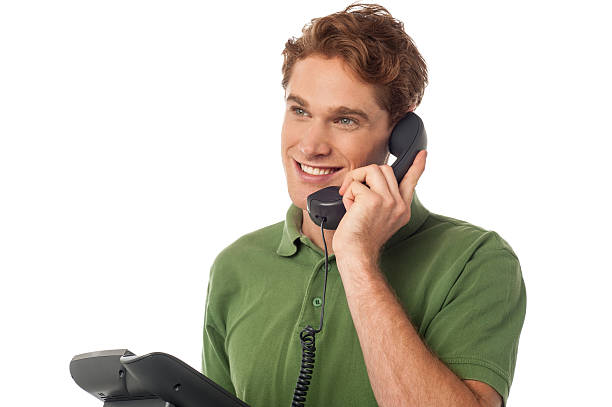 istock Young man talking on the phone 520797944
