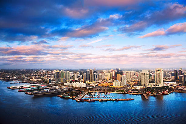 Aerial View of the Downtown San Diego Skyline at Dusk Beautiful downtown San Diego, California shot after a storm cleared at dusk from an elevation of about 300 feet over San Diego Bay during a helicopter photo flight. san diego stock pictures, royalty-free photos & images