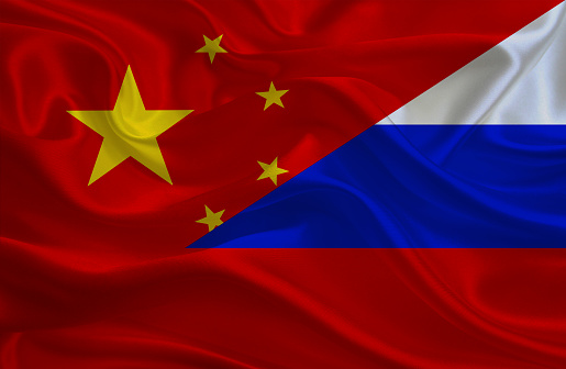 Chinese and Russian flag, three dimensional render, satin texture
