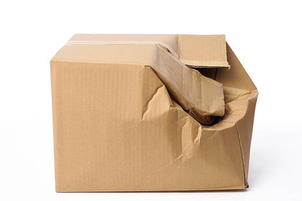 istock Isolated shot of crushed cardboard box on white background 520799946