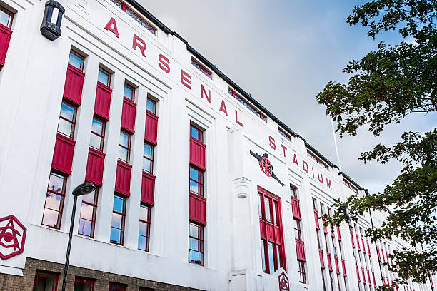 Art Deco east stand at Highbury London, UK - September 24, 2014 : Art Deco east stand at Highbury, former home of Arsenal Football Club. Now converted into luxury residential apartments. decoteau stock pictures, royalty-free photos & images