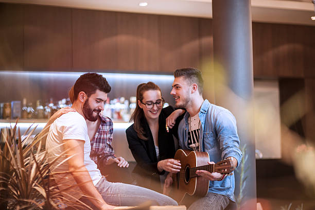istock Group of people having fun and relaxing evening 520805798