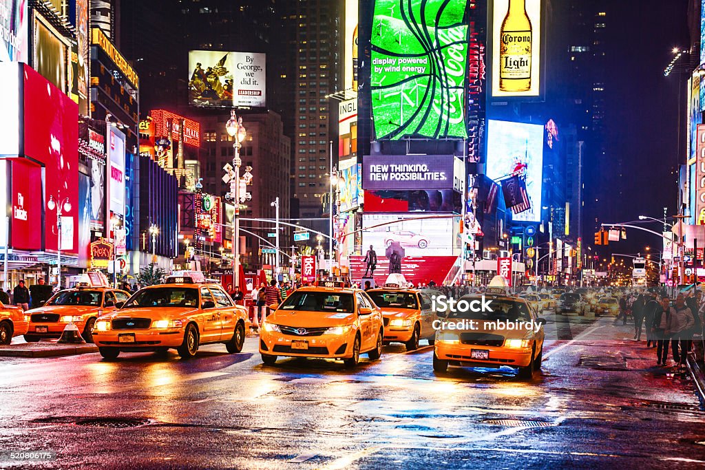Taxis on 7th Avenue at Times Square, New York City Large group of taxis on 7th Avenue at Times Square at night.  7th Avenue Stock Photo