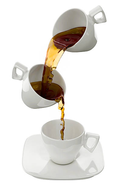 istock Cup of coffee with splashes, isolated on white 520807167