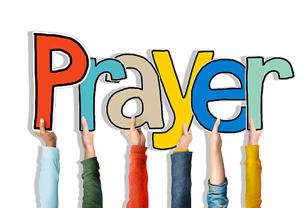 istock Diverse People's Hands Holding Word Prayer 520808887
