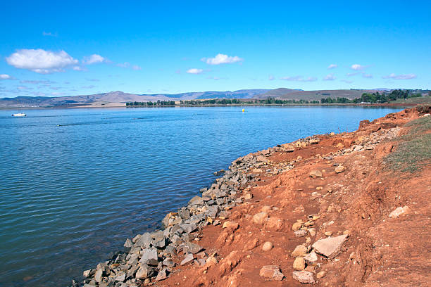 istock Shoreline Depicting Drop in Level of Midmar Dam 520810213