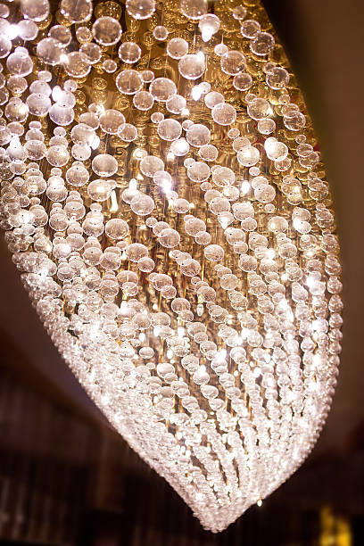 istock Large modern chandelier in hotel lobby 520831586