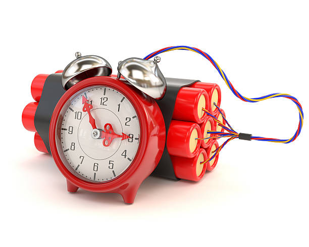 istock Bundle of dynamite and clocks isolated on white background.3d illustration 520832530