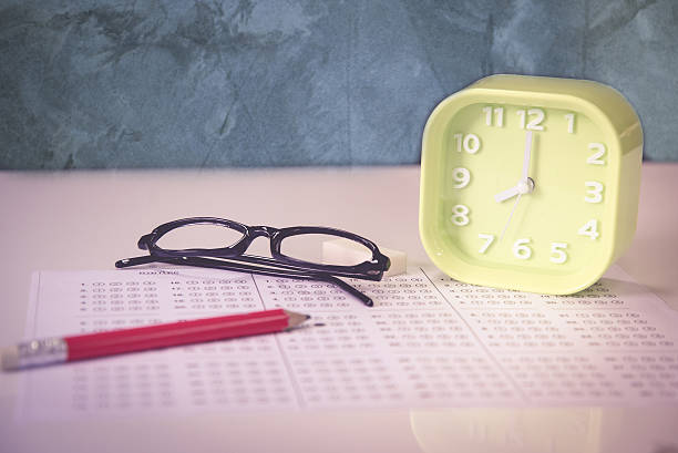 istock Glass with clock in exam concept 520832694