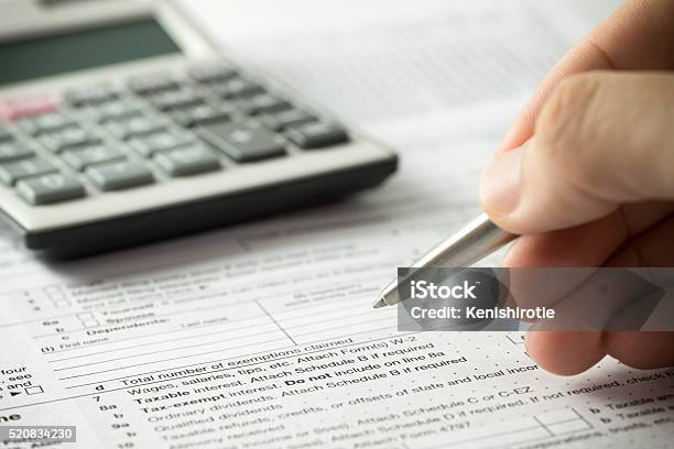 Income Tax Filling Stock Photo - Download Image Now - Tax, Filing Documents, Service