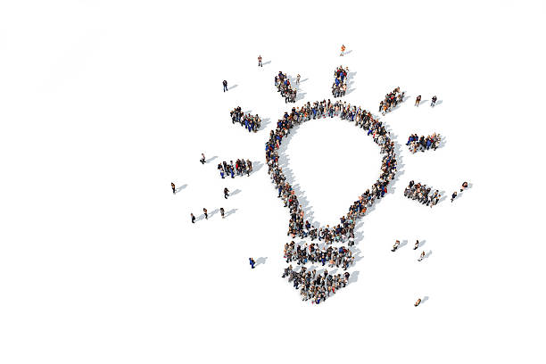 istock Group of people forming a lightbulb icon 520835388