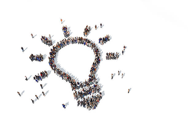 istock Group of people forming a lightbulb icon 520835440