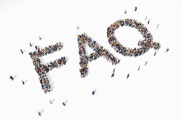 istock Group of people forming FAQ word 520835830