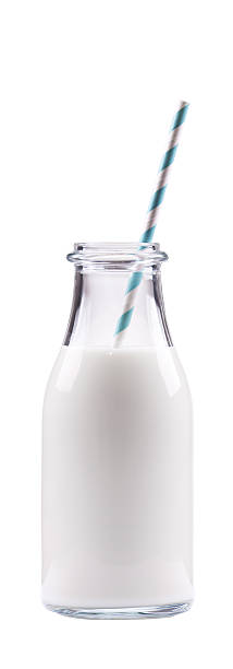istock Bottle of milk with white and blue straw 520835846