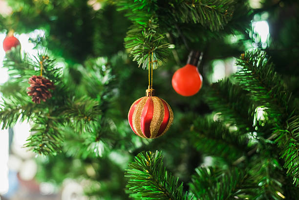 istock Red Christmas ornament hanging 520836124