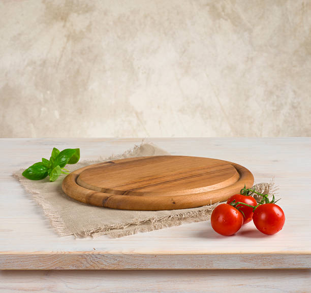 istock Background with table and kitchen board over vintage wall background 520837927