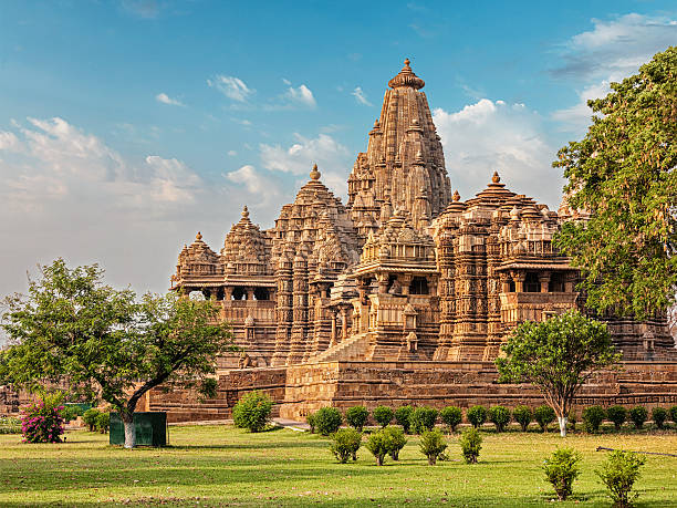 Famous temples of Khajuraho Famous indian Madhya Pradesh tourist landmark - Kandariya Mahadev Temple, Khajuraho, India. Unesco World Heritage Site indian temples stock pictures, royalty-free photos & images