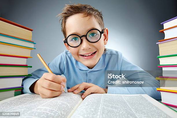 Clever Schoolkid Stock Photo - Download Image Now - Book, Boys, Child