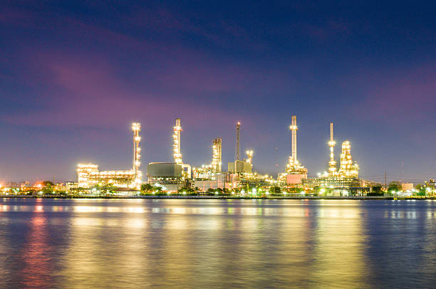 istock Oil Refinery Plant and tanker Working at dusk 520839889