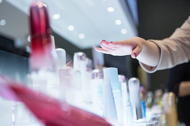 istock Woman showing beauty product 520840377