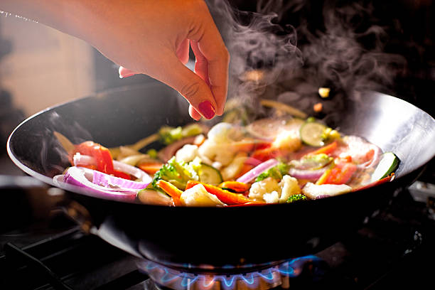 istock Woman salting her meal 520840661
