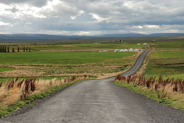 istock Gravel empty rural route in iceland 520841641