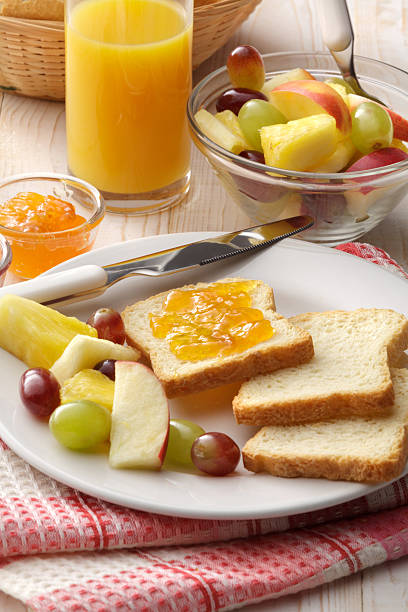 Breakfast: Toast, Fruit Salad and Orange Juice