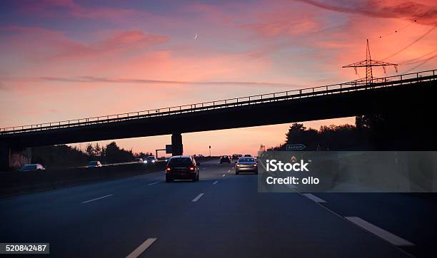 German Highway Autobahn At Dusk Stock Photo - Download Image Now - Asphalt, Autobahn, Blurred Motion