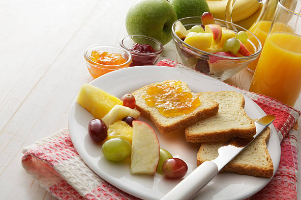 istock Breakfast: Toast, Fruit Salad and Orange Juice 520842492