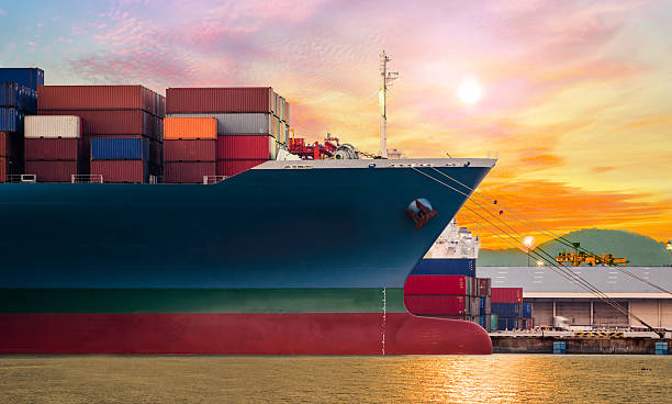 Container ship in import,export port at the harbor Container ship in import,export port at the harbor with beautiful twilight sky wine shipping stock pictures, royalty-free photos & images