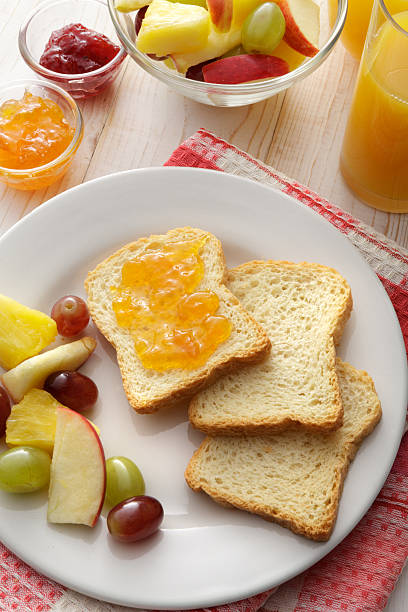 istock Breakfast: Toast, Fruit Salad and Orange Juice 520842704