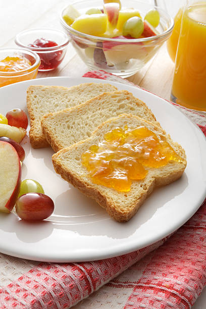 istock Breakfast: Toast, Fruit Salad and Orange Juice 520842894