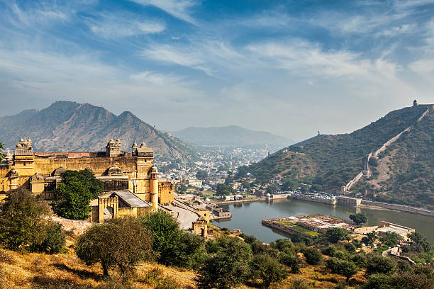 Amer aka Amber fort, Rajasthan, India Indian travel famous tourist landmark - view of Amer (Amber) fort and Maota lake, Rajasthan, India jaipur stock pictures, royalty-free photos & images