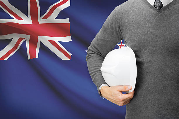 Architect with flag on background  - New Zealand