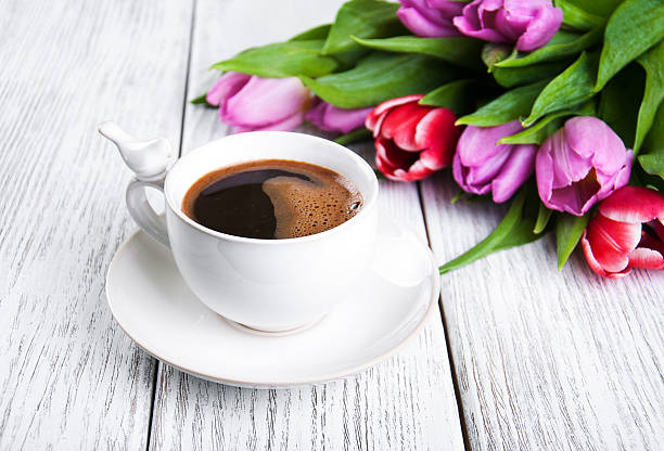 istock cup of coffee with tulips 520843580