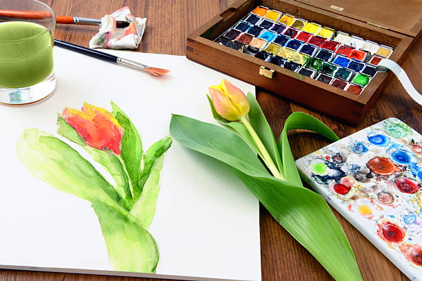 istock Painting tulip with water colours. paintbrusher aside 520843646