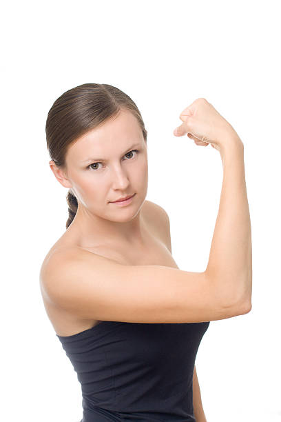 istock Young beautiful woman with a fist 520843710