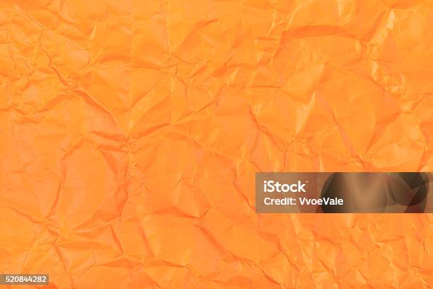 crumpled orange paper for orange background Stock Photo