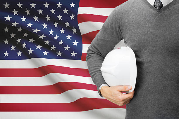 Architect with flag on background  - United States of America stock photo