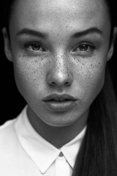 istock Beautiful girl with freckles. 520844657