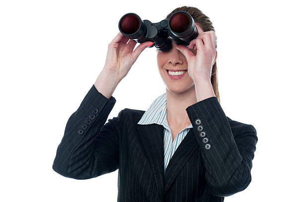 istock Business woman looking through binoculars 520846678