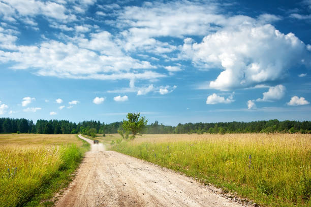 istock Countryside road with a car 520860127