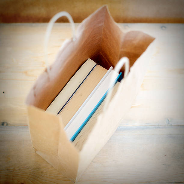 Books in a Paper Bag, close-up.