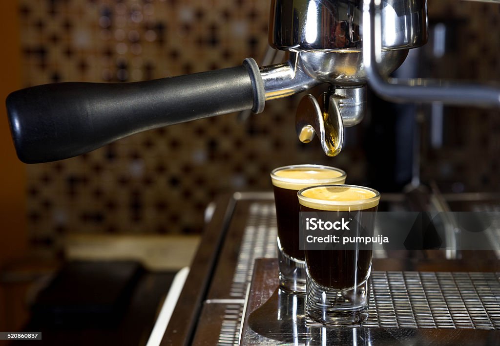 espresso shot espresso double shot from machine Bar - Drink Establishment Stock Photo