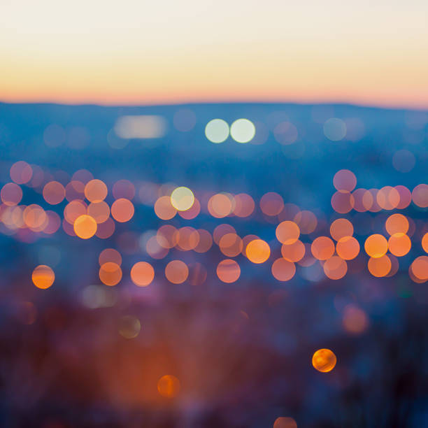 istock big city lights in the twilight evening with blurring background 520862817