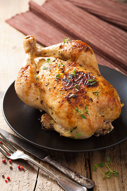 istock whole roasted chicken with pepper and thyme 520865087