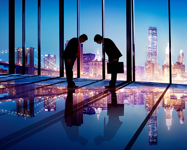 istock Japanese Businessmen Having a Business Agreement 520865787